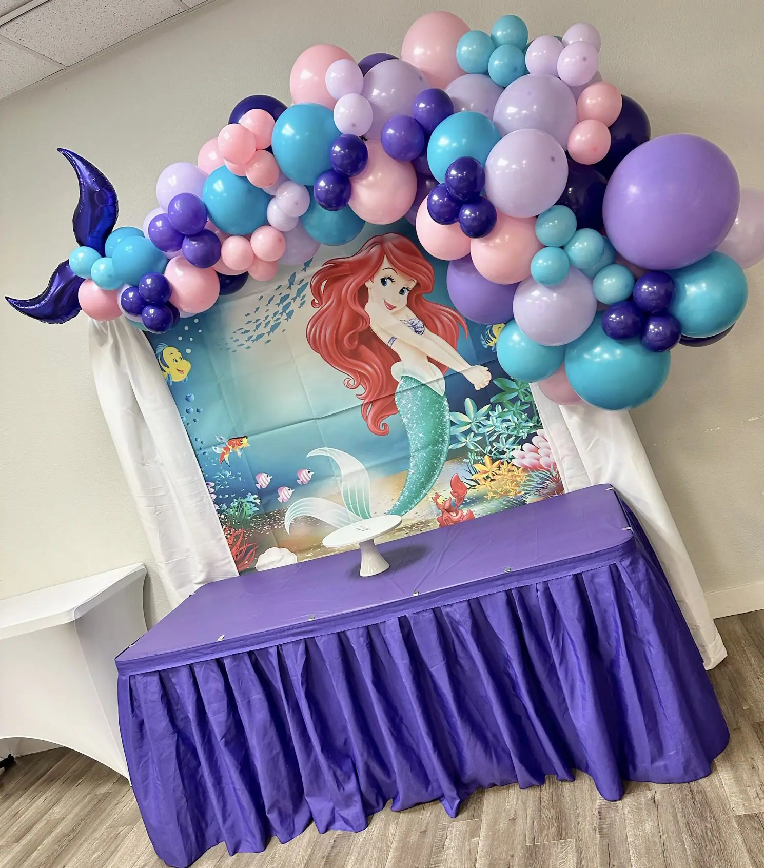 A mermaid-themed birthday setup at Wigglin' Out Indoor Playground.