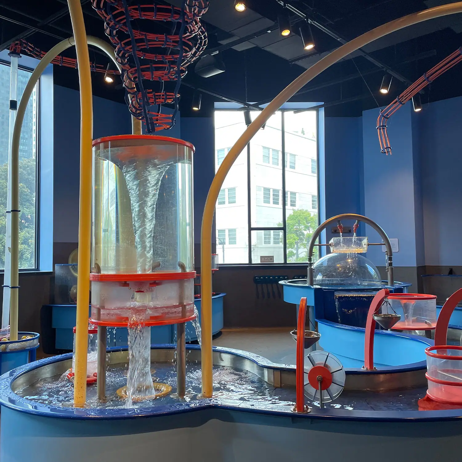 Interactive water-play exhibit inside Itty Bitty Magic City.