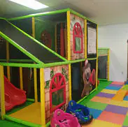 Indoor climbing structure and slide at Wild Wonders Playspace in Conneaut.