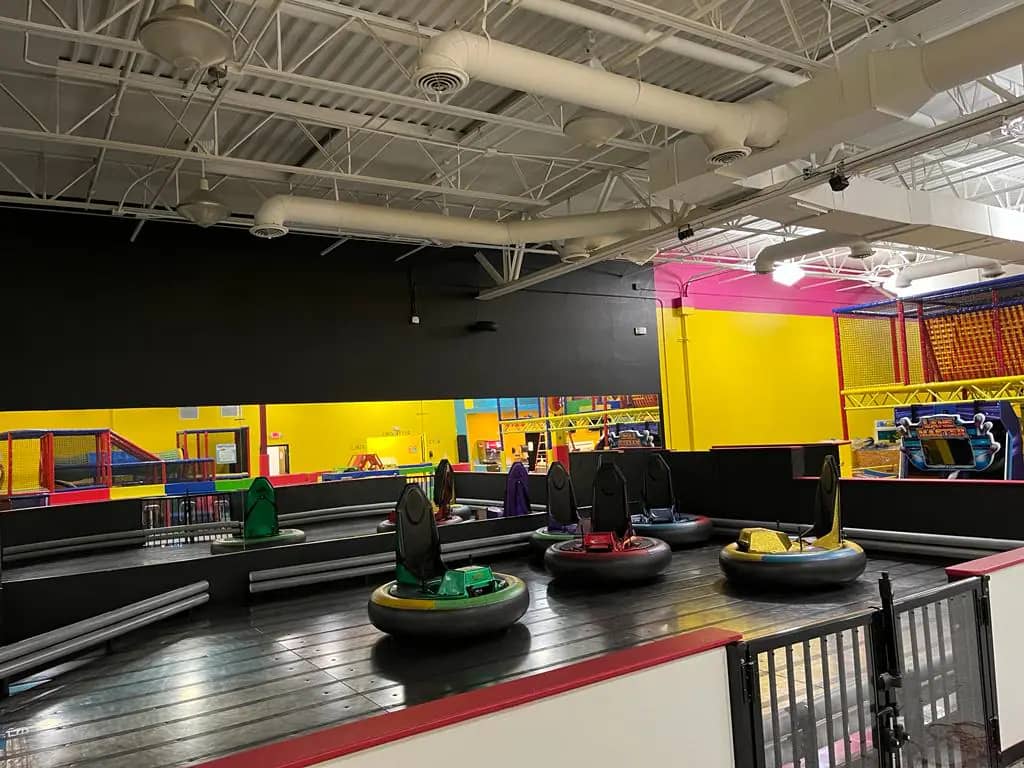Bumper car area inside La La Land Royal Palm Beach.