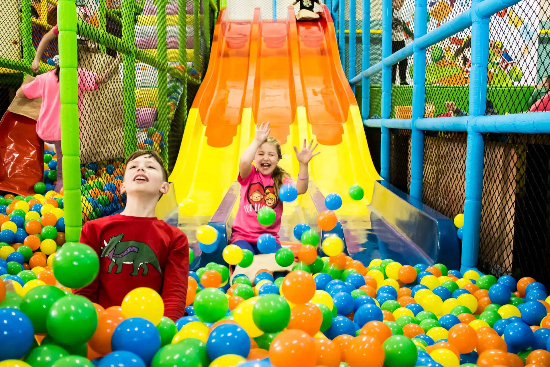 Children playing on slides and soft-play attractions at Kidz Funtown.