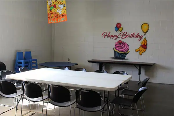 Party room or seating area at First Season Community Center.