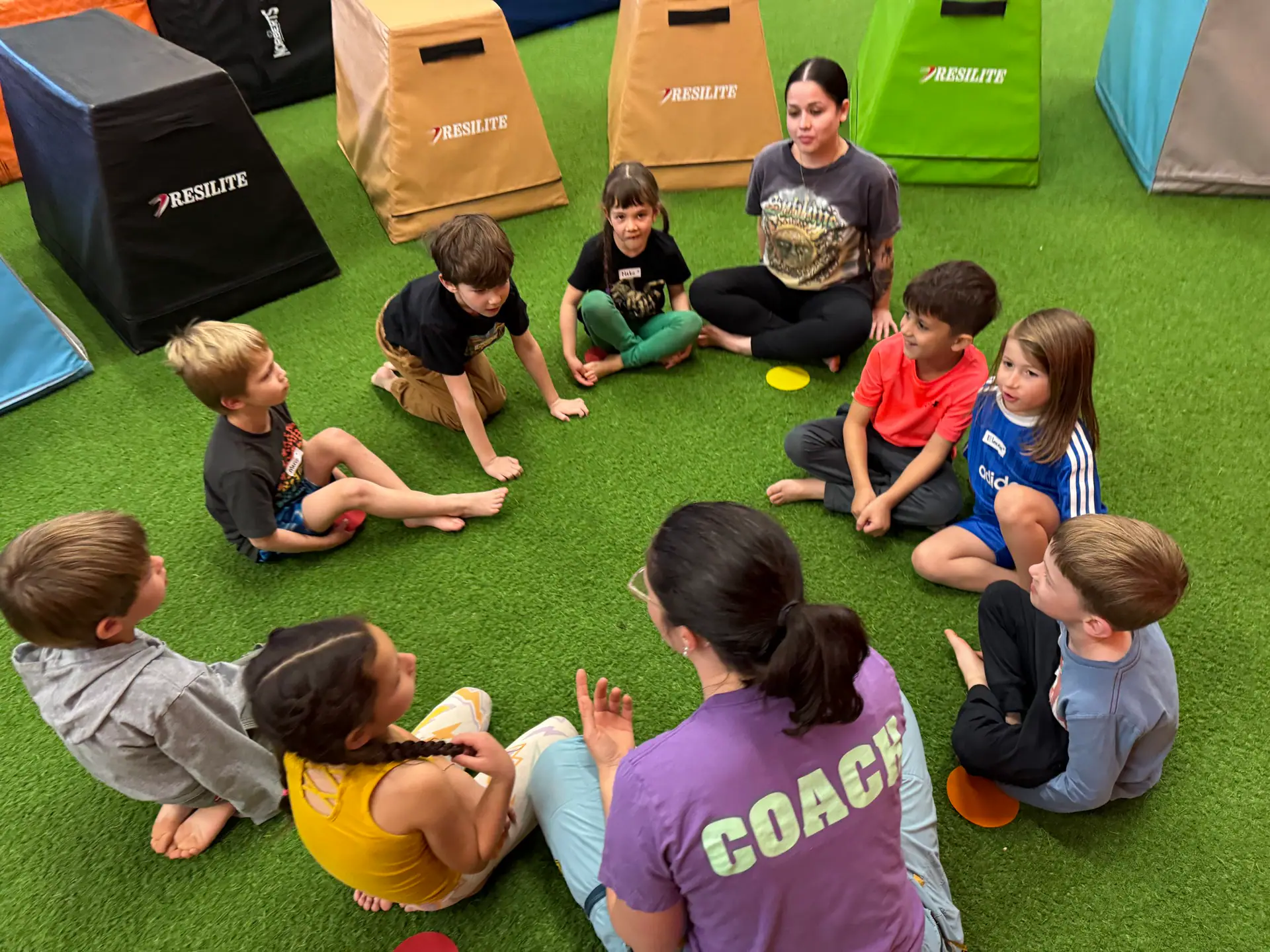 Indoor movement-play setup at Playformance Tucson for young children and caregivers.
