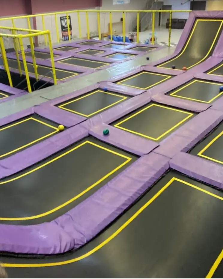 Purple trampoline court inside Airtime Adventures in Farmington.