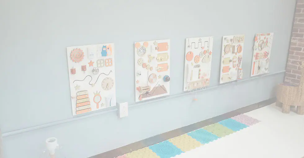 Busy board wall at The Playroom in Morgantown.