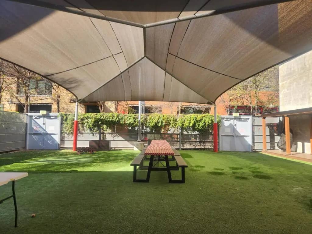 Children playing in Thinkery's outdoor area connected to the museum experience.
