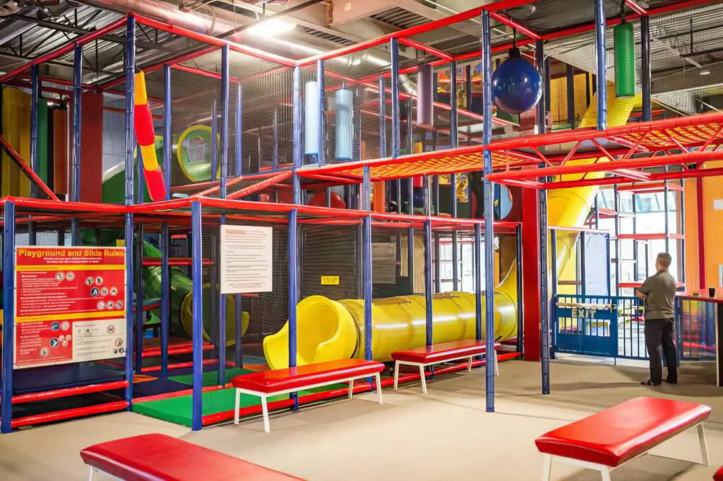 Large multi-level climbing and slide structure at Jump ’n Jammin.