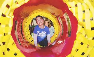 Indoor play area with slides and soft-play elements at Playbox Indoor Playland.