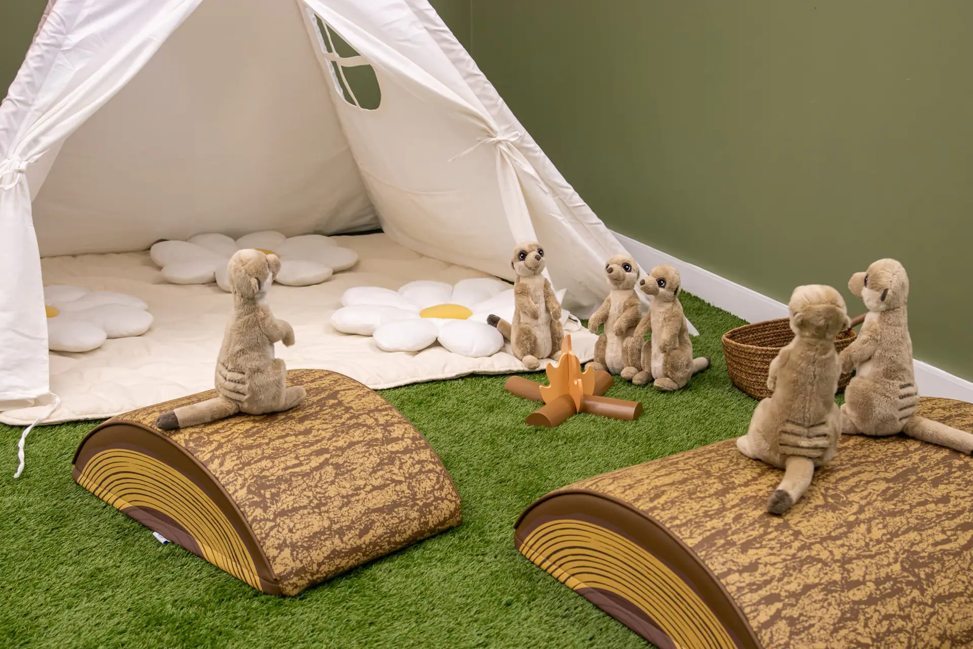 Soft teepee and pretend campfire corner at Little Leaps Play-Cafe.