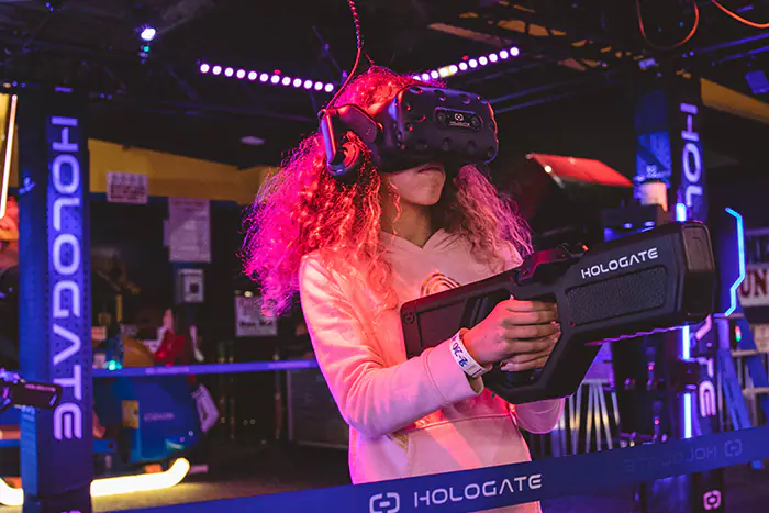 Kids using the Hologate VR attraction at All American Fun Park