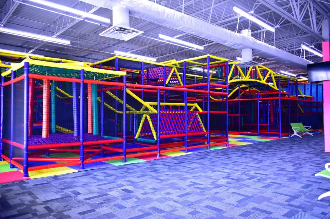 Large indoor climbing and slide structure inside Bizzy Bee Indoor Play Center in North Charleston.