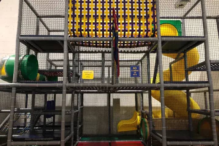 Multi-level indoor playscape at Imagine That!!! in Florham Park.