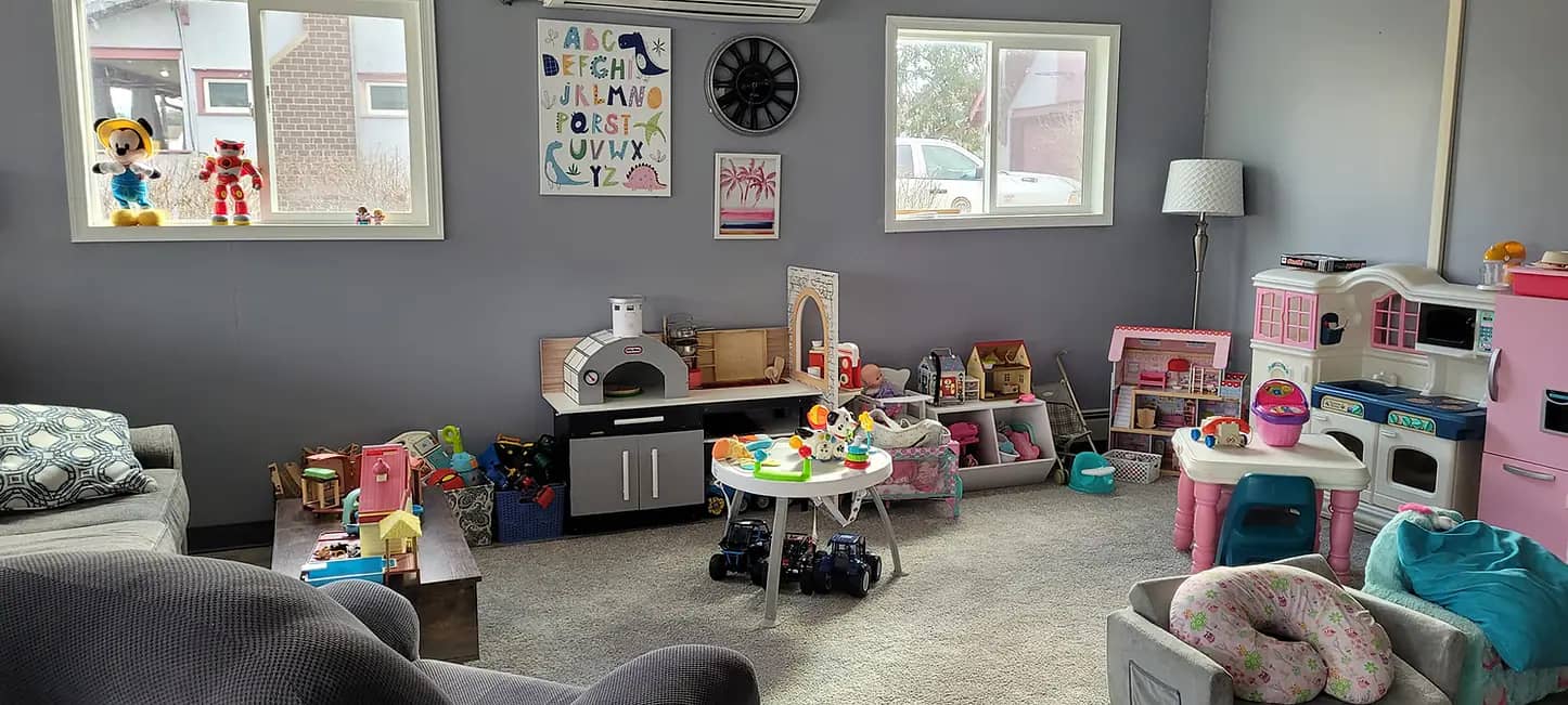 Pretend kitchen and playroom setup inside ABC: A Beautiful Child in Portville