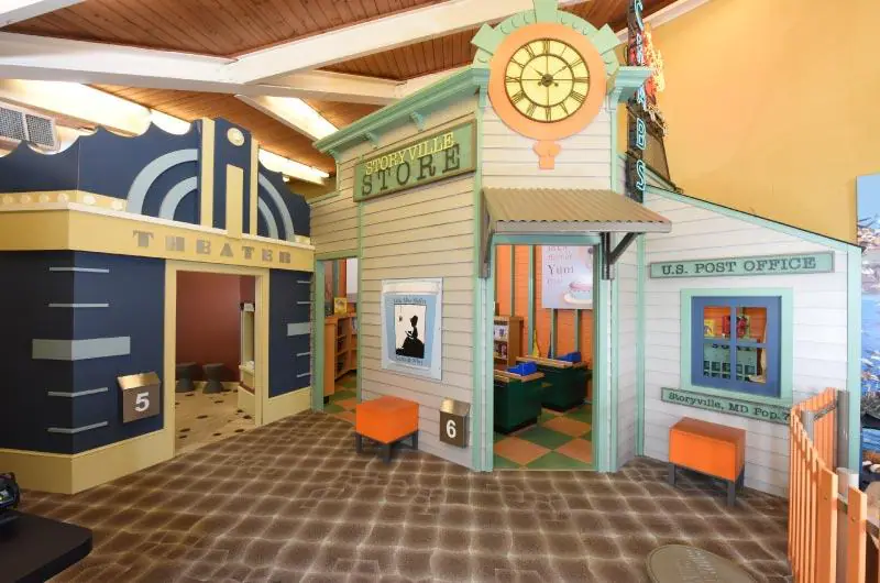 Child-size Storyville storefront play village inside the Rosedale library branch.