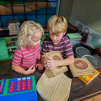 Children playing inside Discovery City Children's Museum in Port Huron.