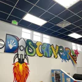 Discover mural inside Redwood Discovery Museum