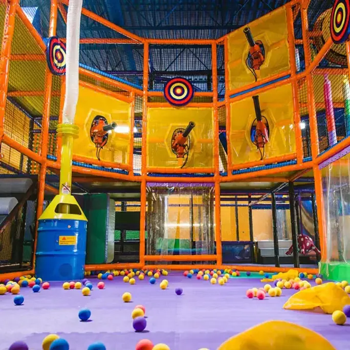 Colorful indoor play structure at Playdate LLC in Birmingham.