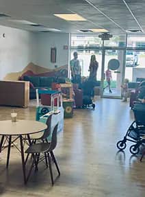 Interior seating and play area at Desert Bloom Play Cafe in Los Alamos