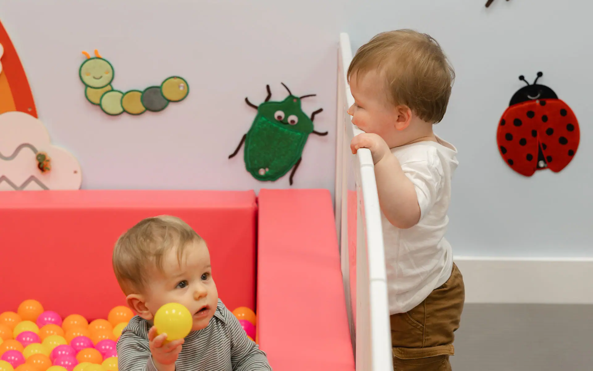 Baby-friendly ball pit and soft play area at Happy Days Play Cafe