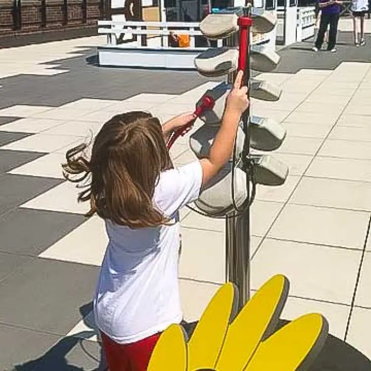 Rooftop play and musical exploration area at inspireU