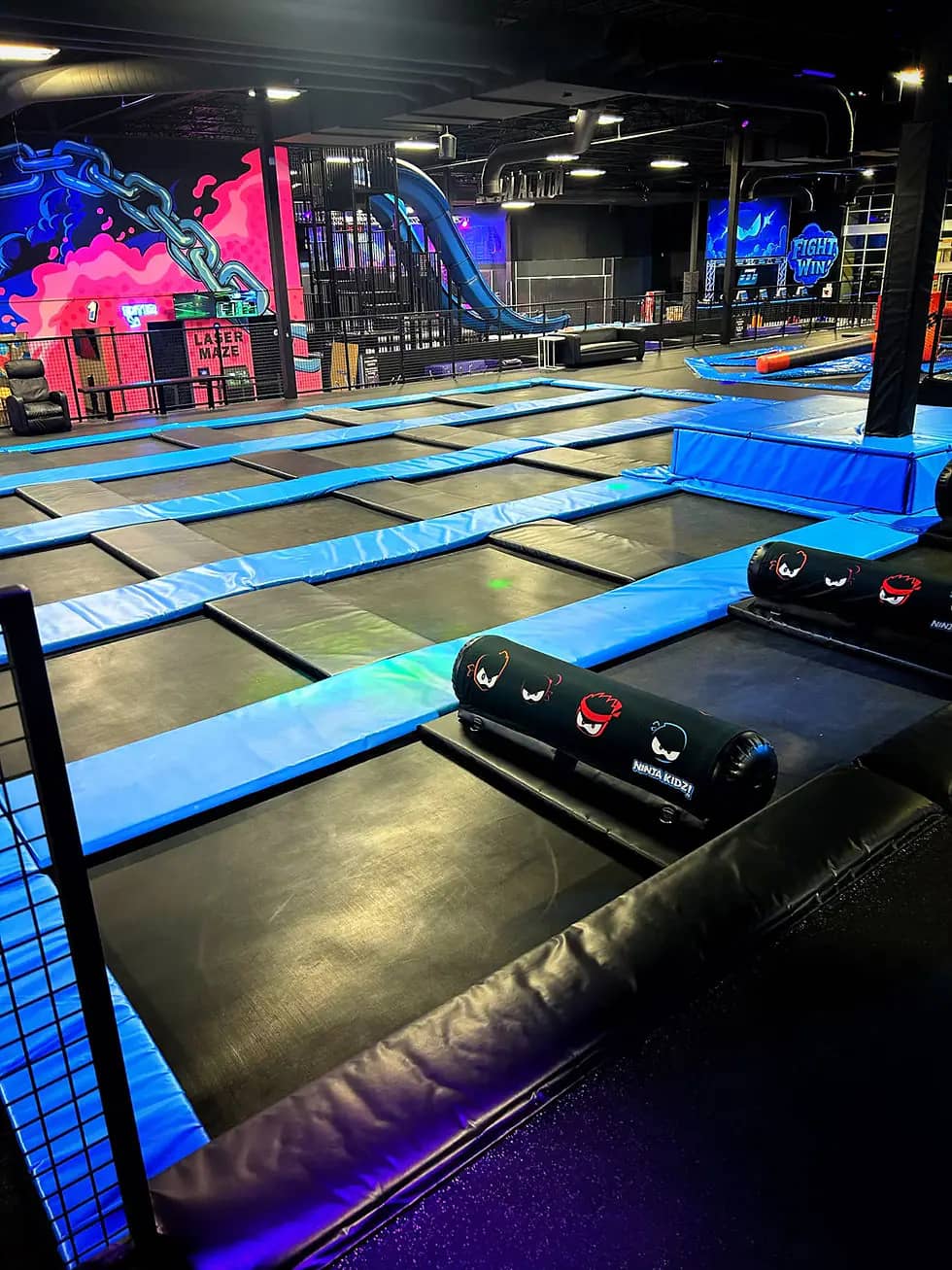 Wide view of the trampoline and active play zones at Ninja Kidz Action Park Greensboro.