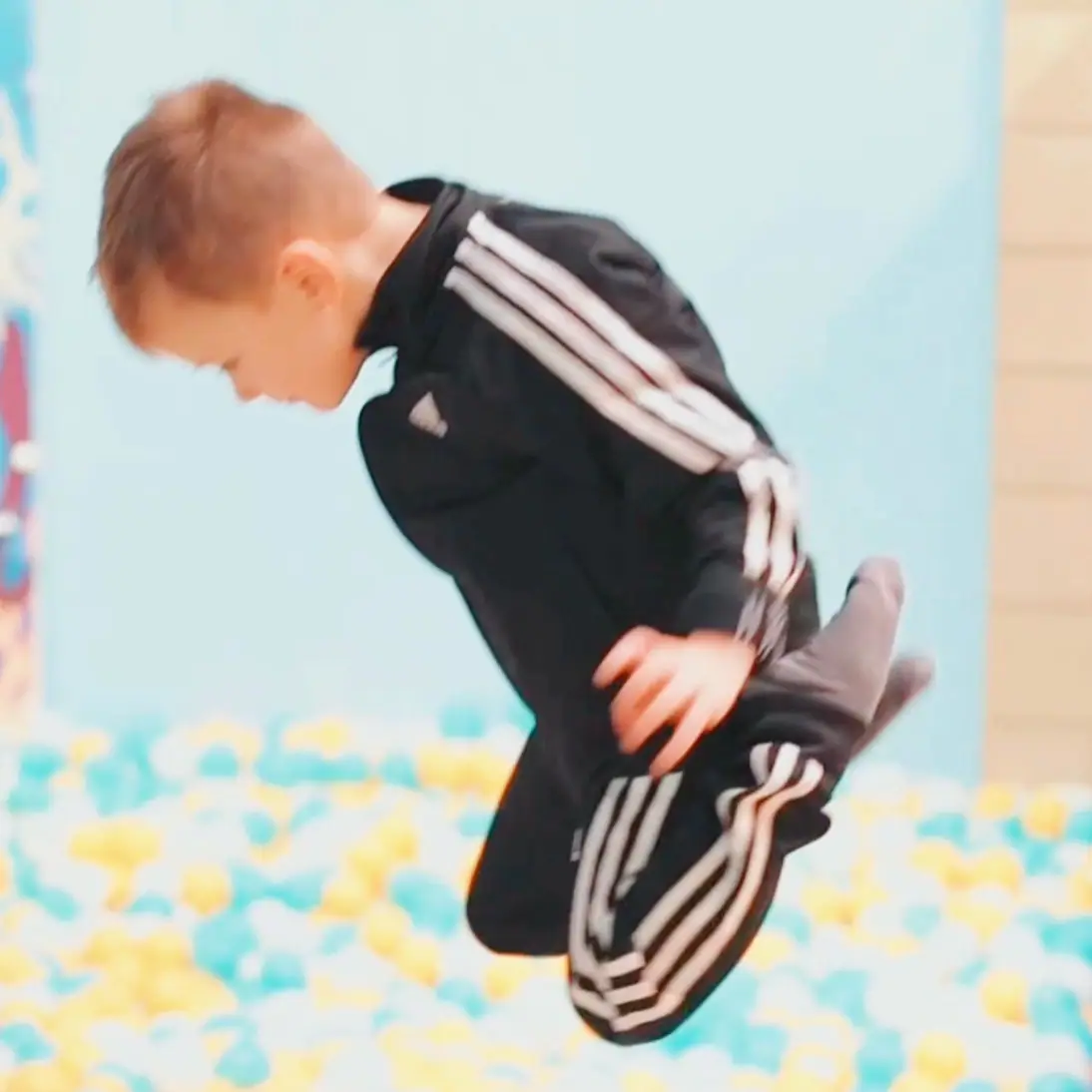 A child jumping into the ball pit at Jersey Sea.