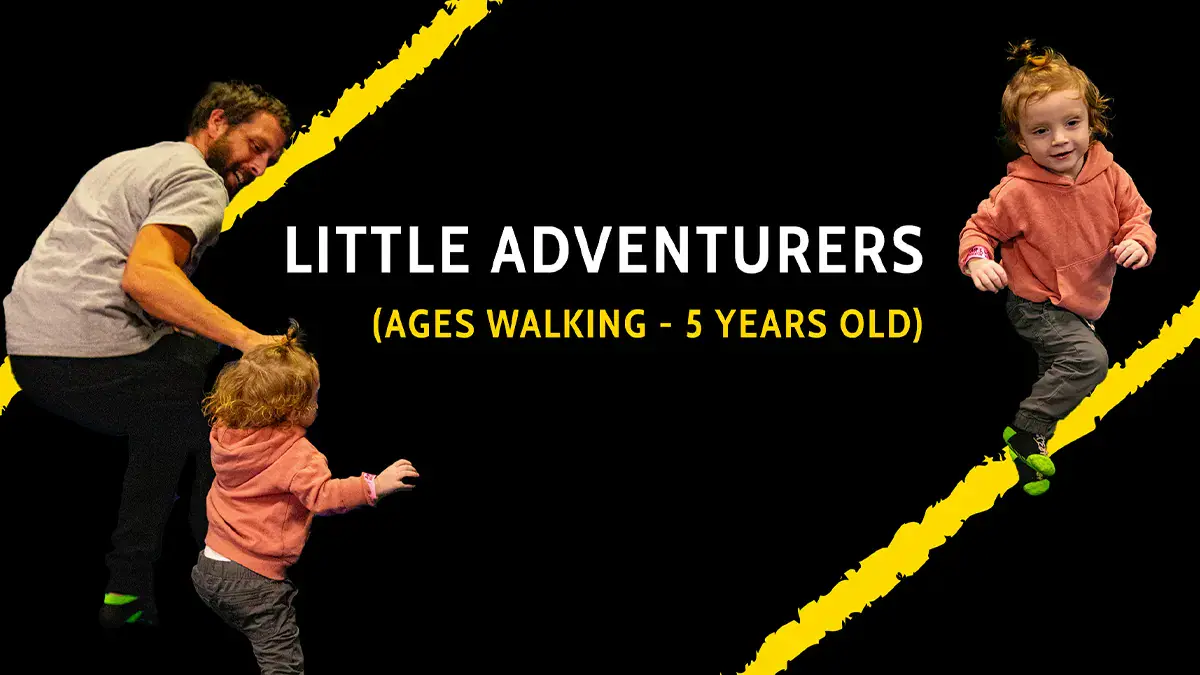 Parent and young child in the Little Adventurers program at Airborne Adventure Park.