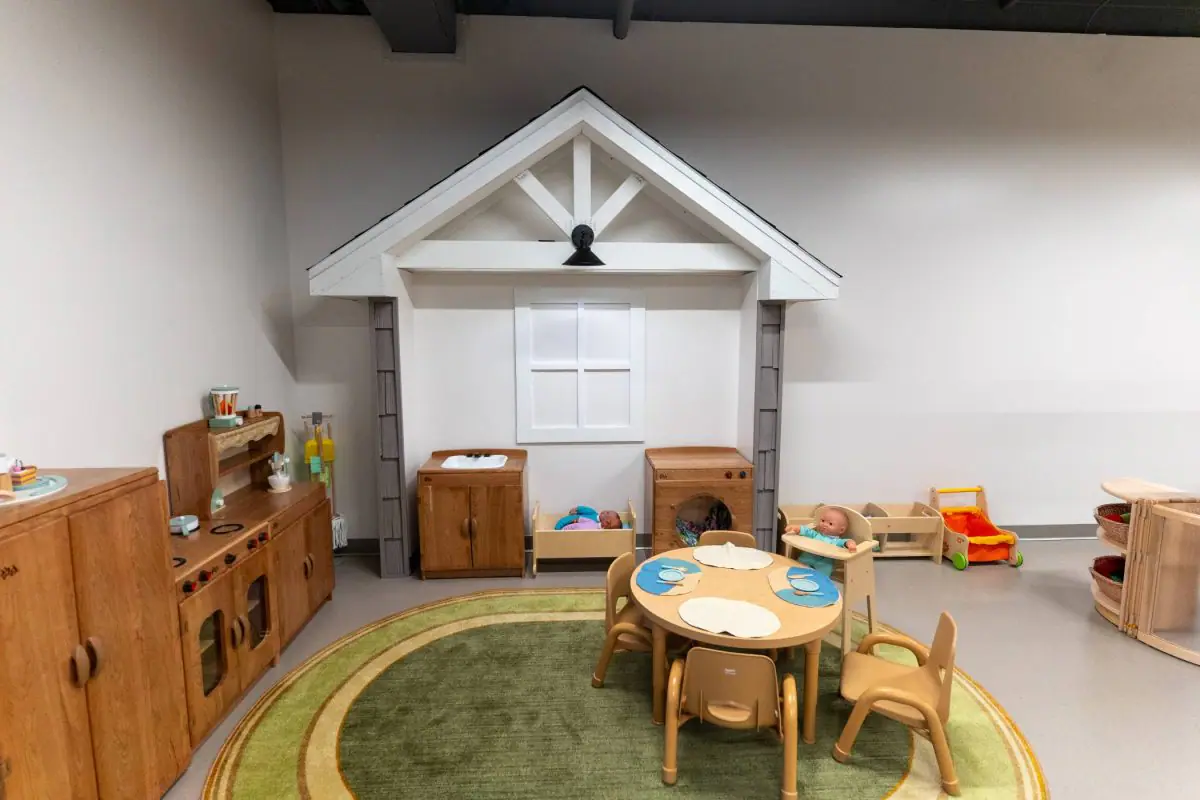 Family seating and play zones inside LilyPad Café & Playcenter.