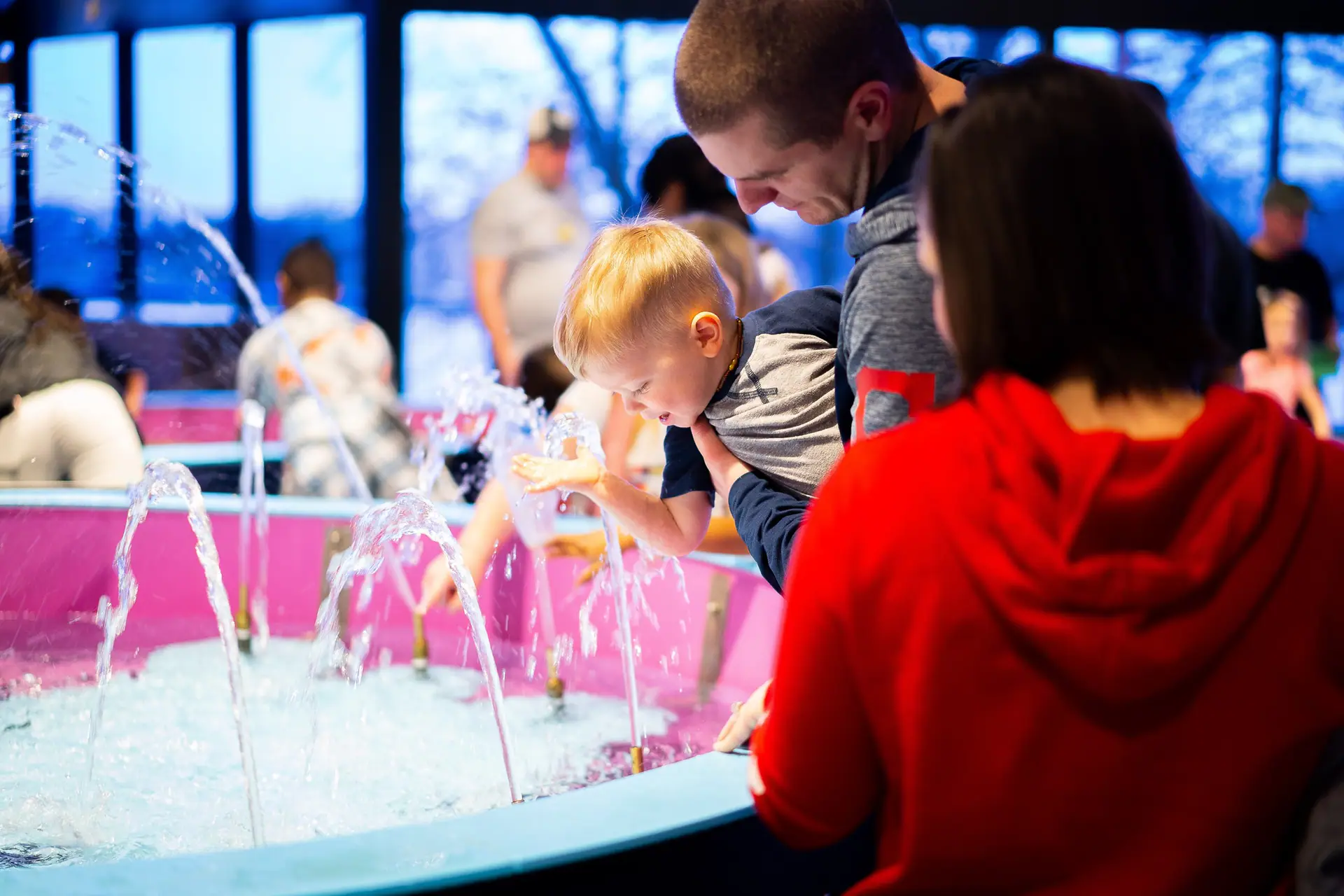 Families exploring the Water Works exhibit at Imagination Station in Toledo