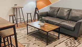 Adult lounge seating inside Mezanmi Play Cafe