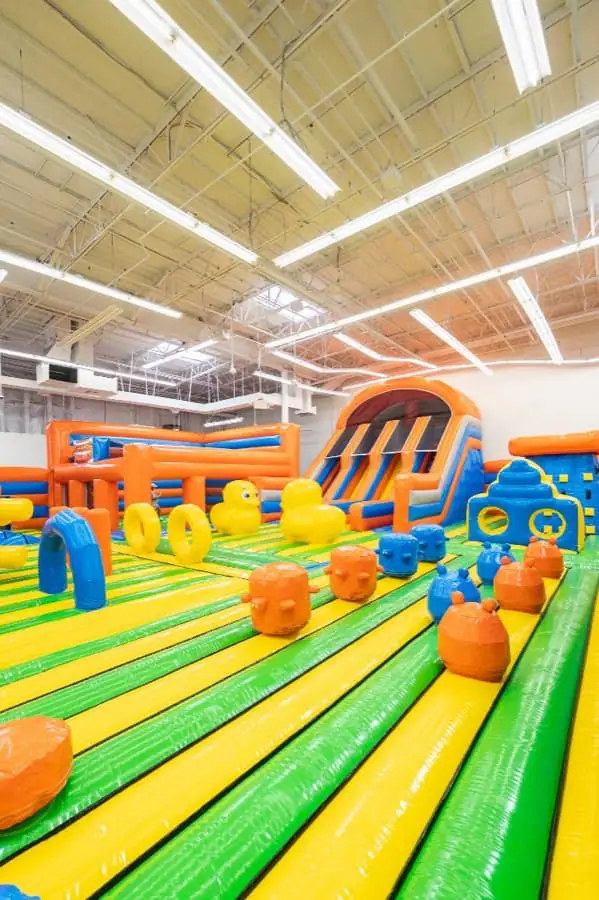 Large inflatable play area inside Play City.