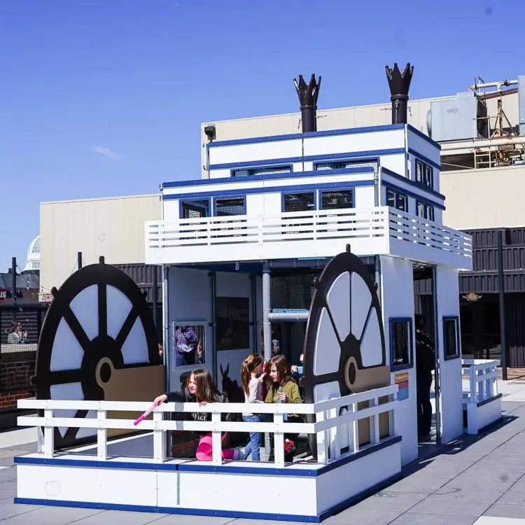 Children using active rooftop play features at inspireU