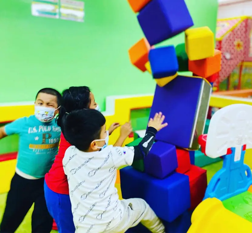 Children playing inside Kidz Fun Palace in Corona, Queens.