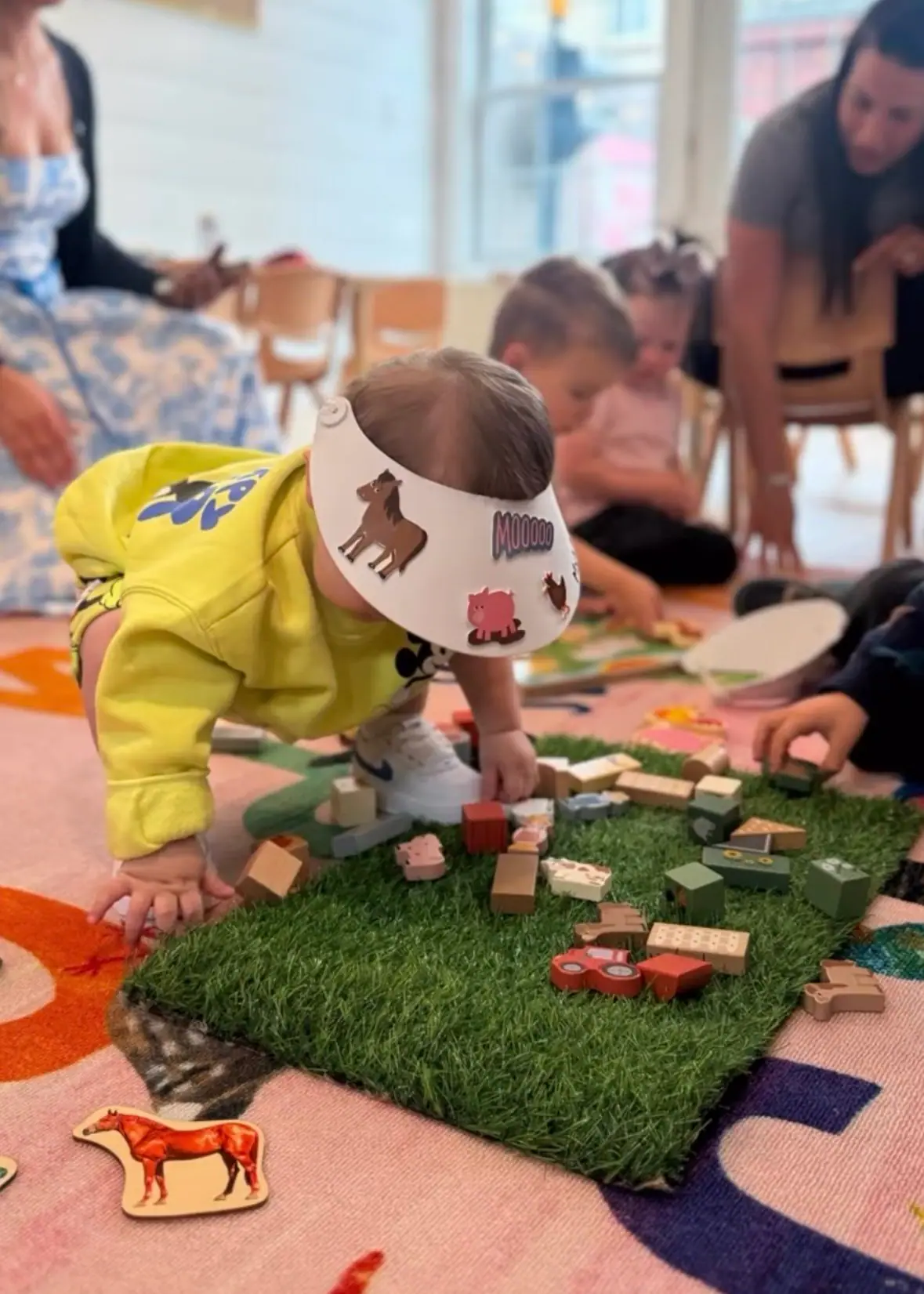 Group activity inside Schoolhouse Play & Cafe.