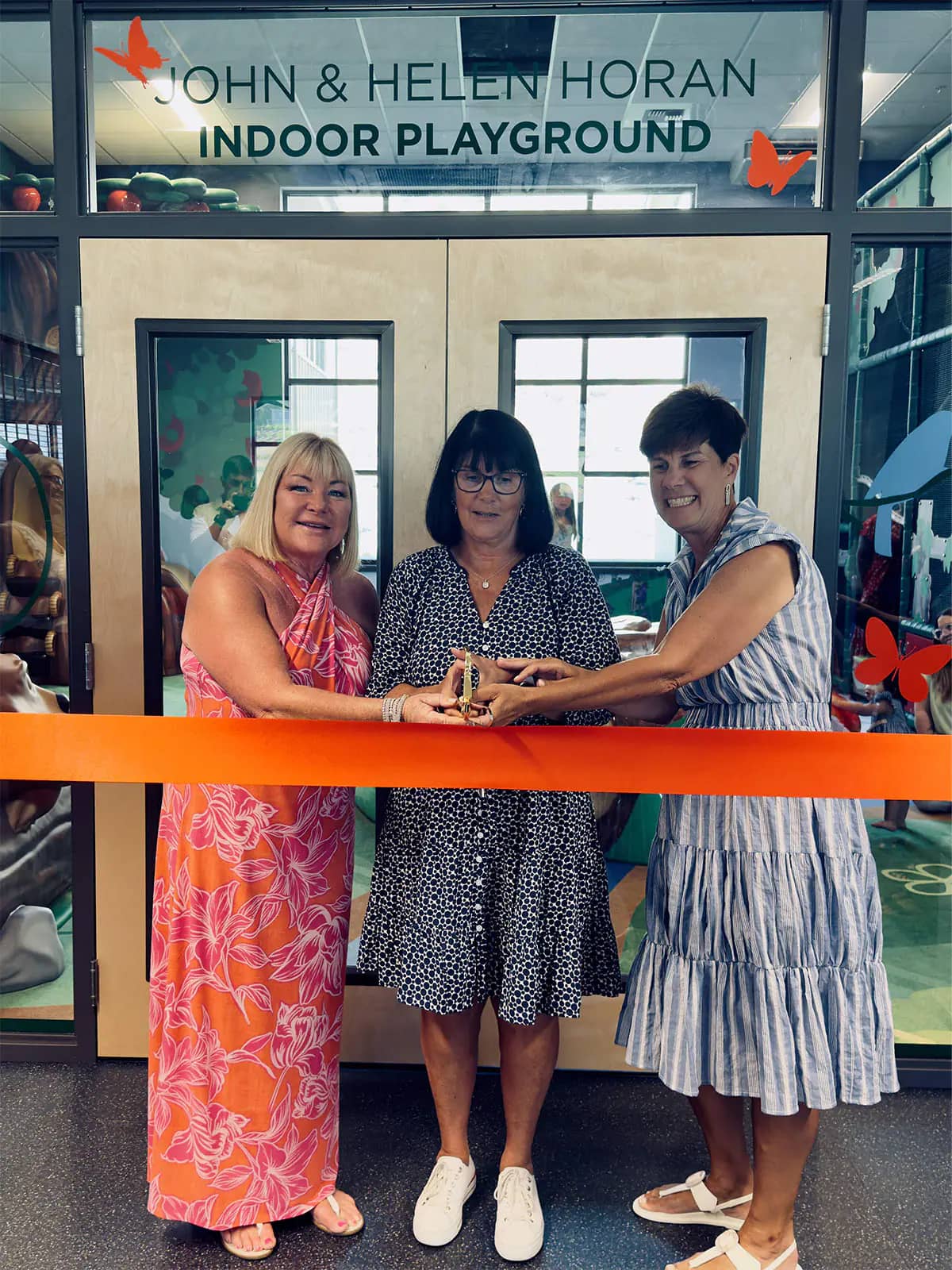 Ribbon cutting for the John & Helen Horan Indoor Playroom dedication in Chelan.