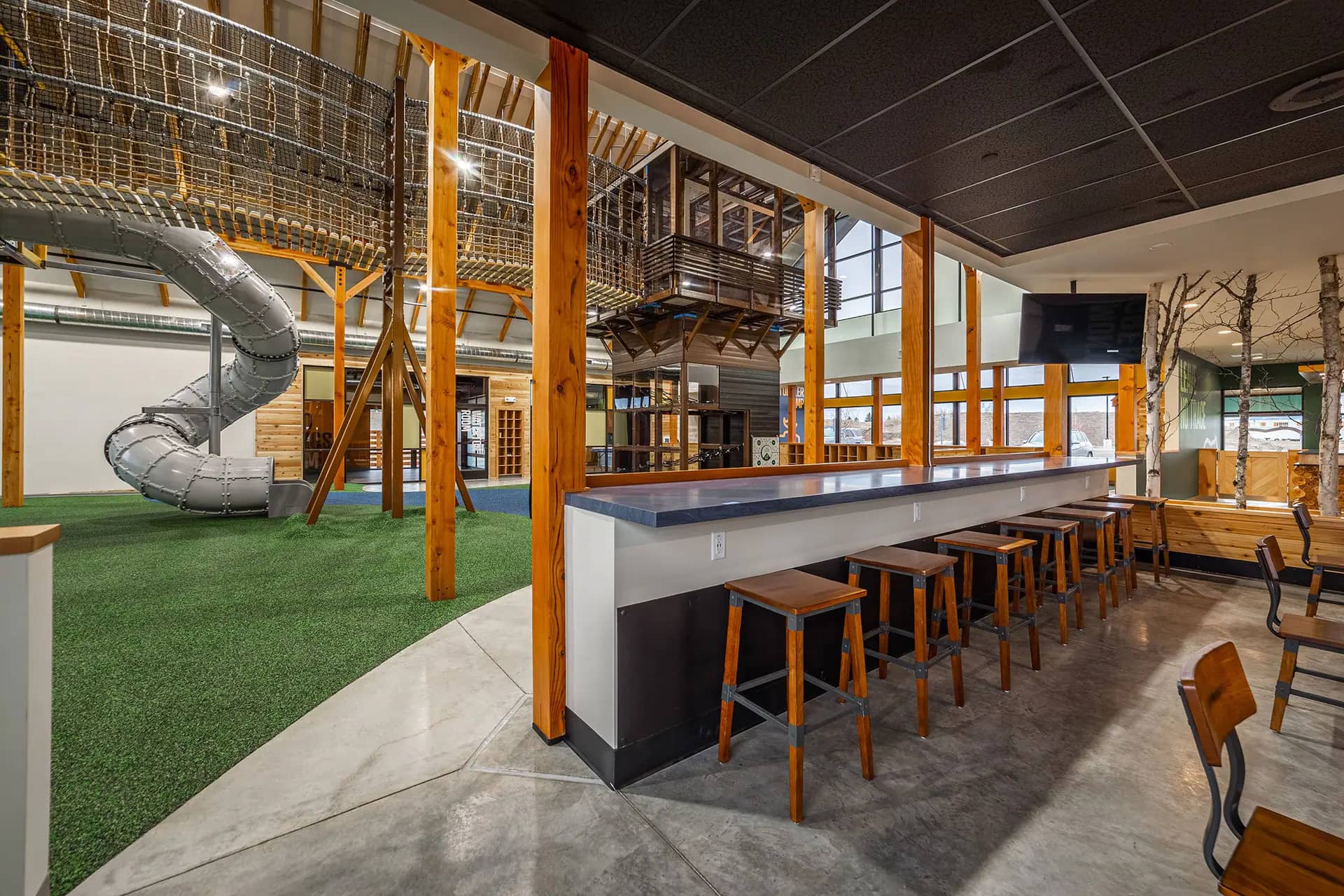 Cafe counter and seating area overlooking the play floor at Montana's Great Indoors.
