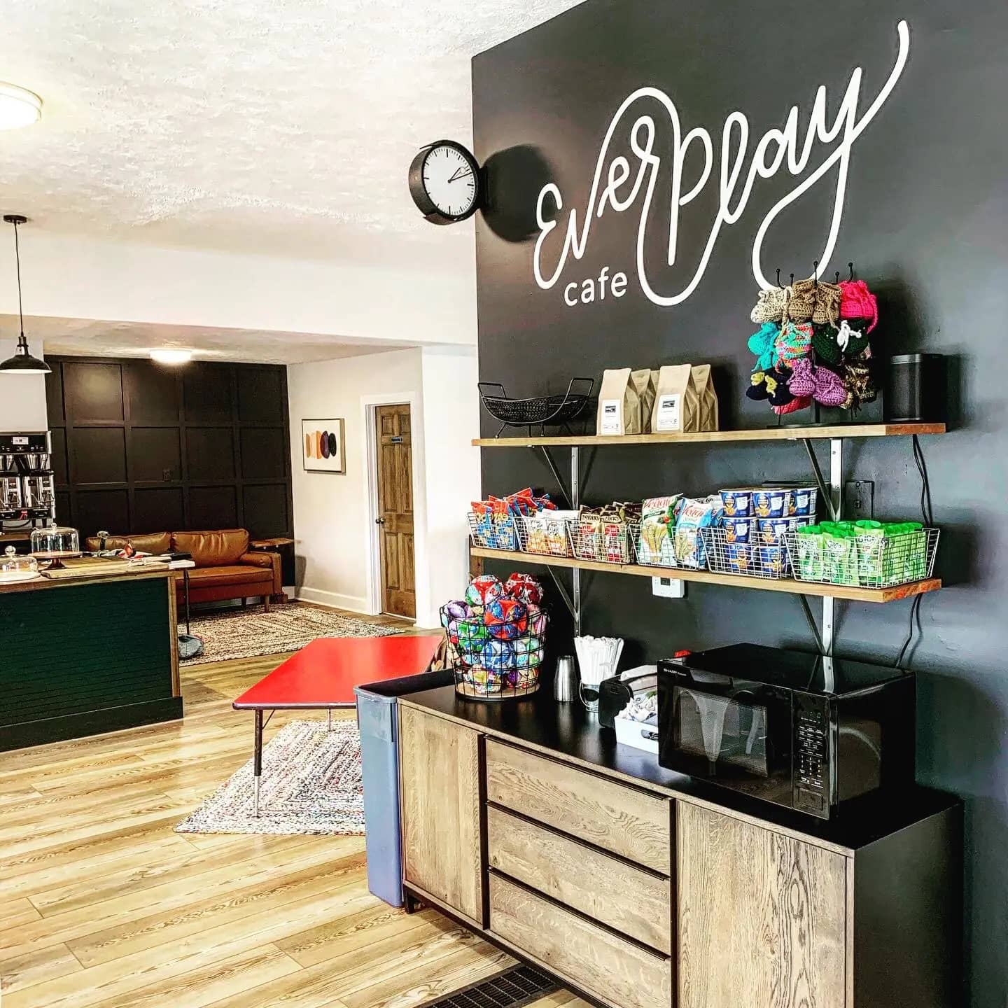 Seating and indoor play zones at EverPlay Cafe.