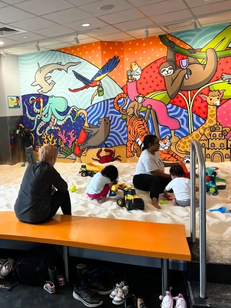 Indoor sandbox play area at Sandmagination in Peabody