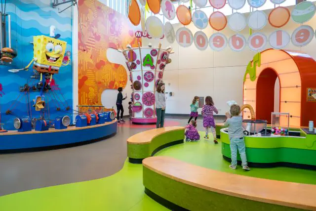 Kids exploring an interactive exhibit at the Amazeum
