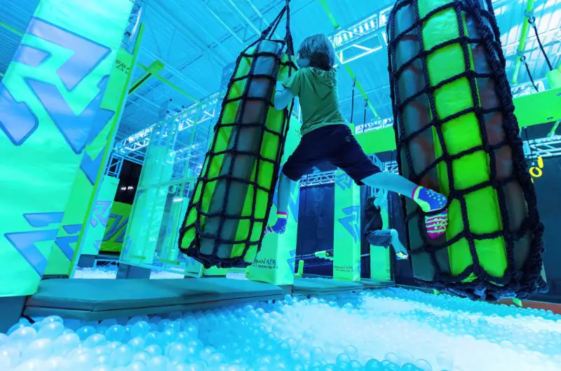 Kids using attraction equipment at Urban Air Adventure Park in Port St. Lucie