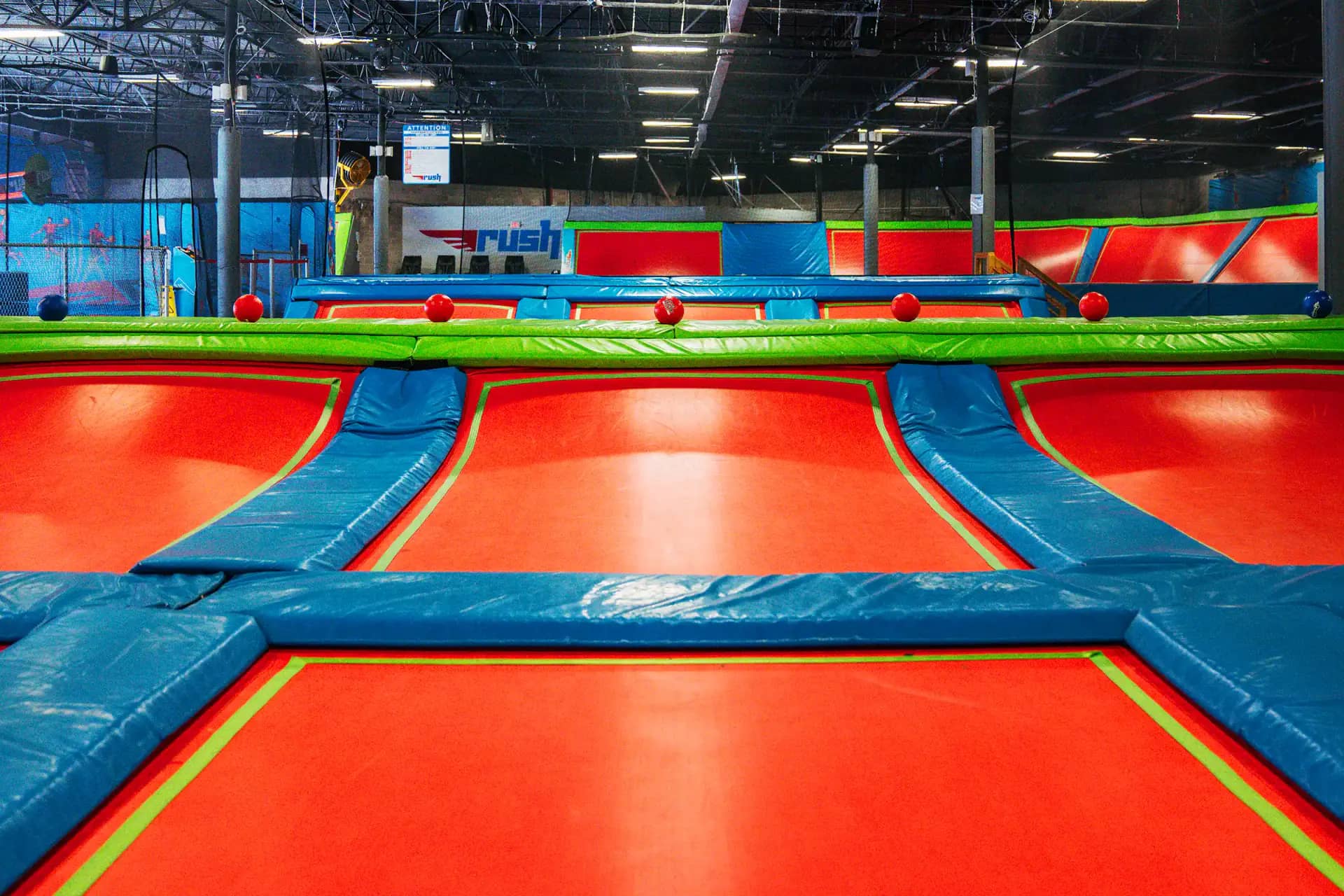 Main trampoline area at Rush Athens.