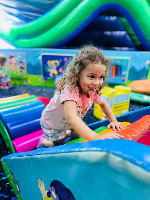 Colorful indoor attraction area at Xplore Family Fun Center in Port Jefferson Station.