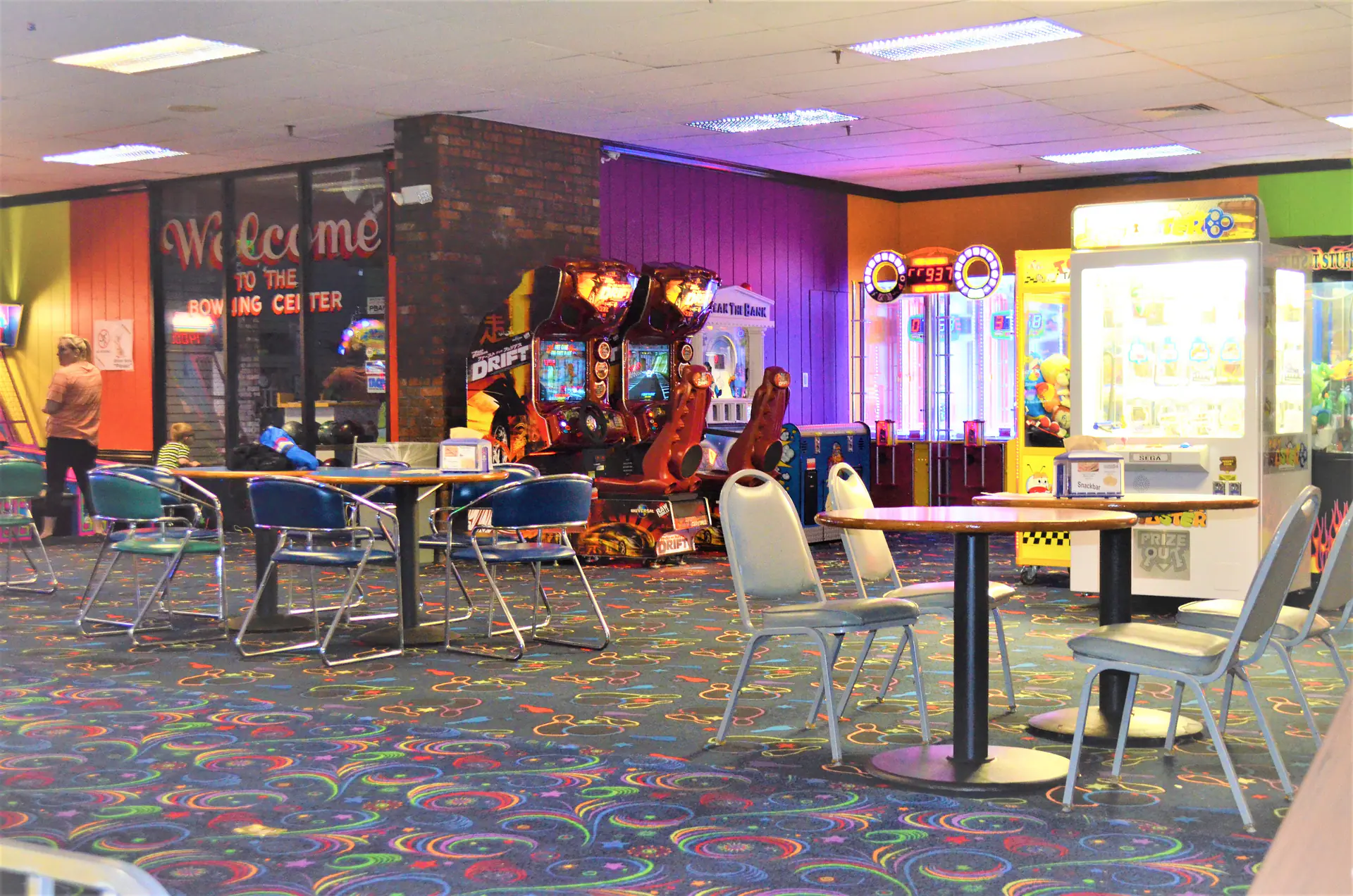 Interior play space at Strikerz Party & Play with colorful family-entertainment features.