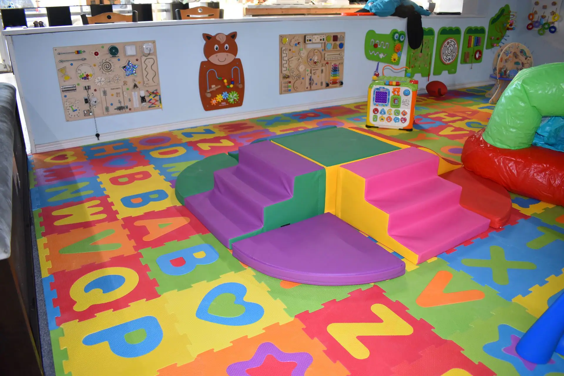 Toddler-friendly indoor play area inside Imagination City in Abilene.