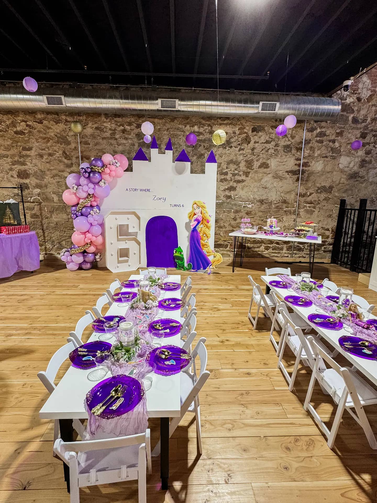 Birthday party setup inside the event space at The Little Playhouse Cafe.