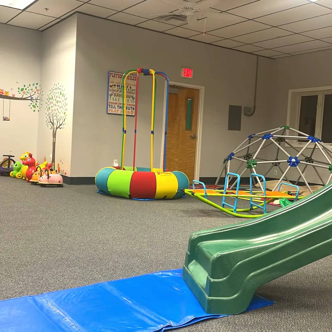 Indoor climber and slide area at The Rumpus Room.