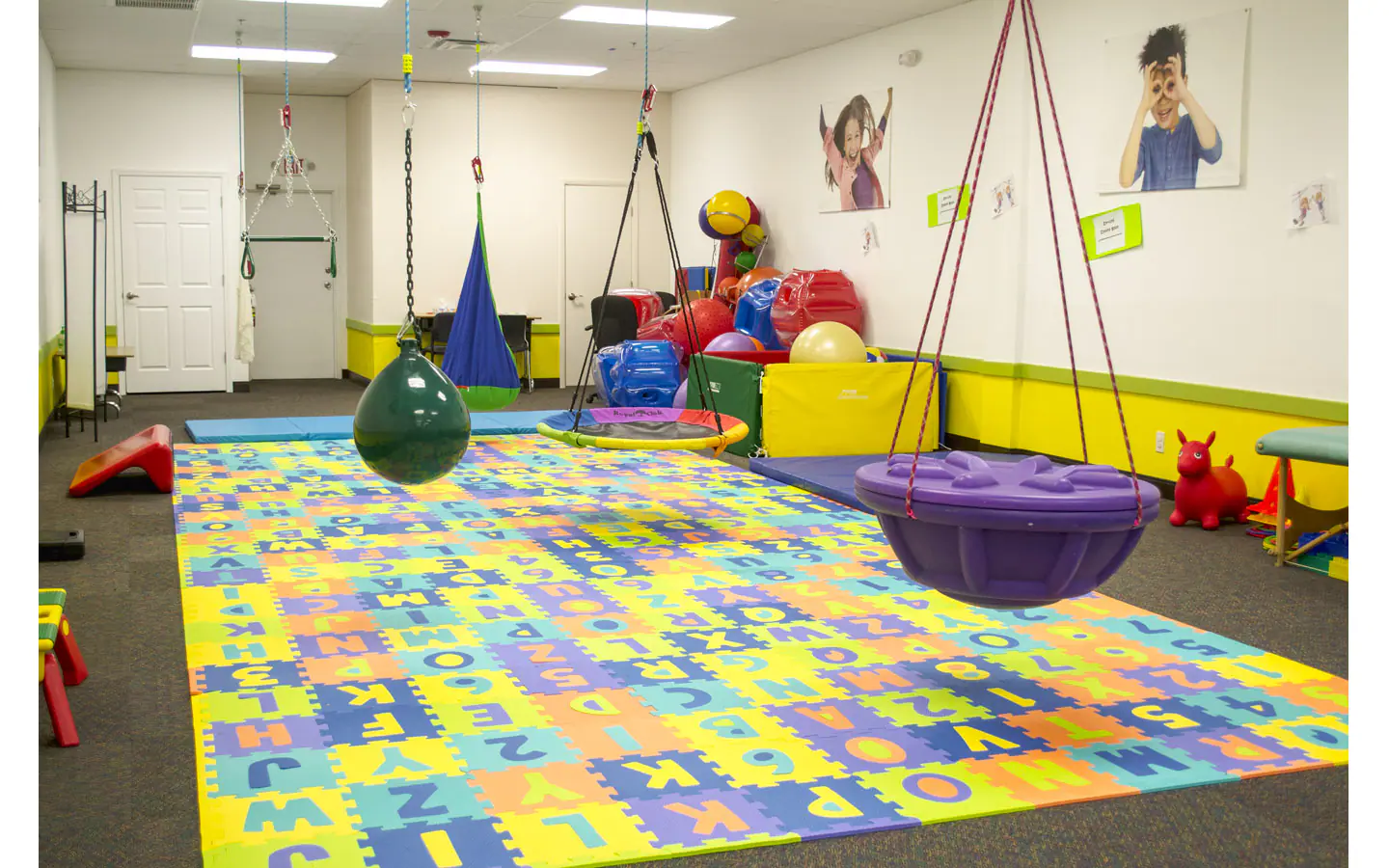 Play mats, and sensory swings at POP Through Play Gym