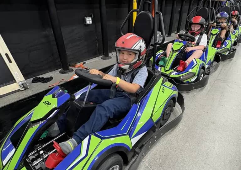 Children riding junior go-karts at MACH1 Adventure Park.