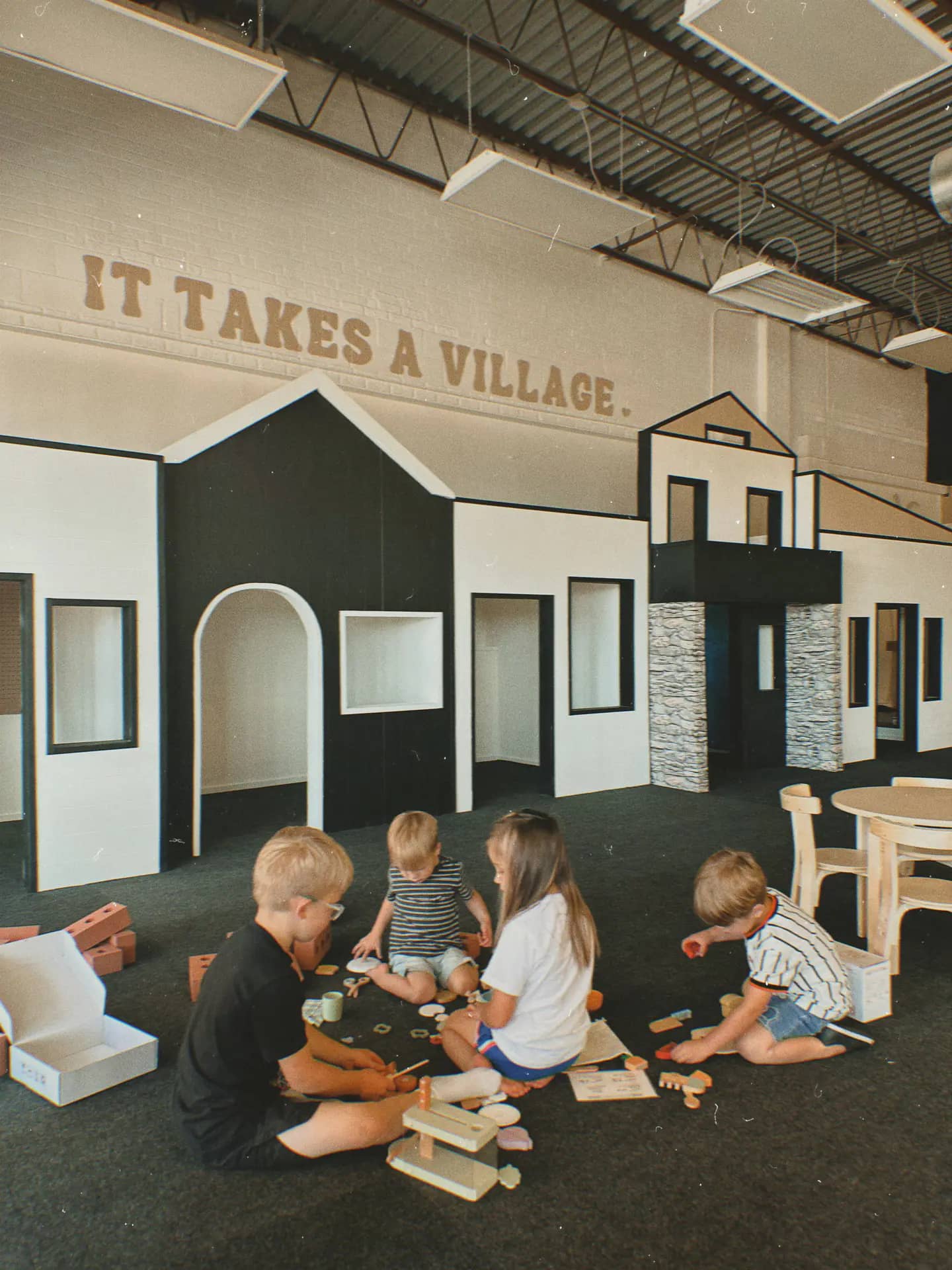 Play & Party Co. mini town playhouse area in Wichita.