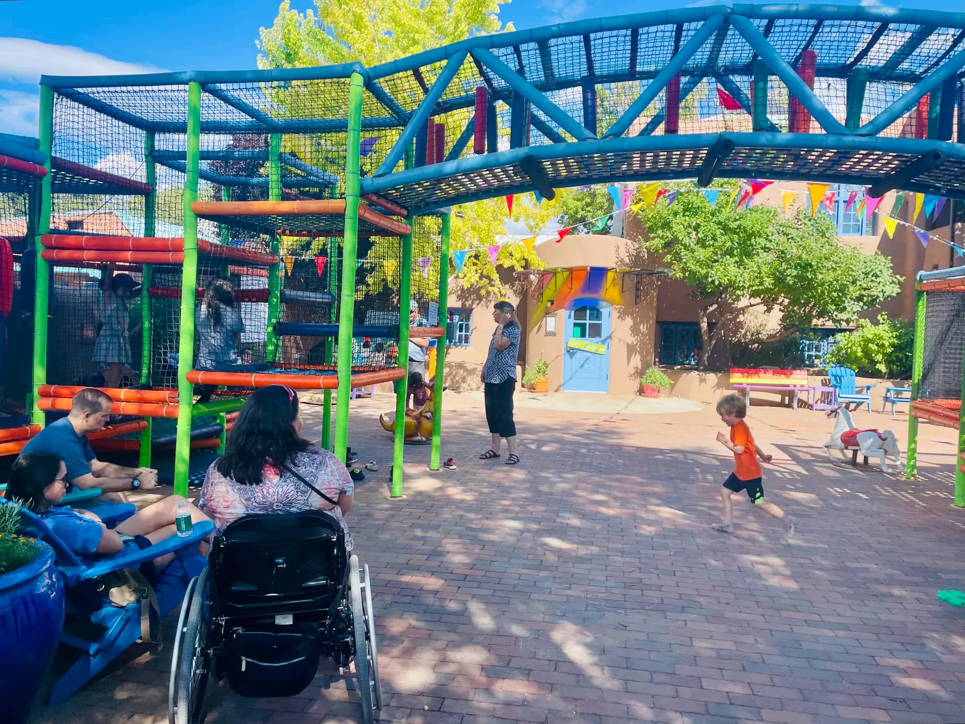 Twirl's outdoor play structure and courtyard area in downtown Taos.